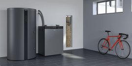 Pelletheizung im Hauswirtschaftsraum mit Pelletlager und Warmwasserspeicher